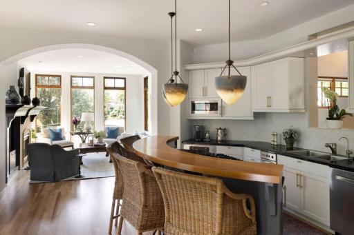 Enjoy this fabulous gourmet kitchen with granite countertops, stainless appliances, tiled backsplash and plenty of storage