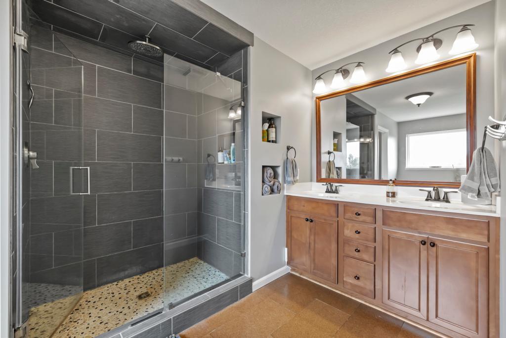 Primary bath features Cork Flooring which is always warm to touch