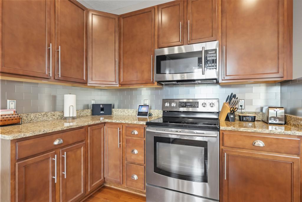 Upgraded Cabinetry, matches hardwood floors