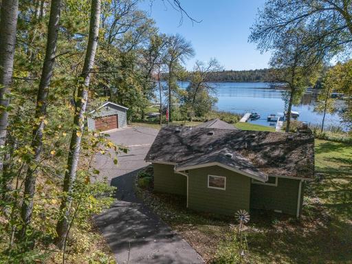 Welcome to 616 Shady Lane NE and 150' of shoreline on Lawrence Lake! Your own private 1 acre retreat!