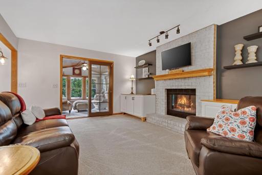 Welcome home! Family room with floor to ceiling fireplace and newer carpet!