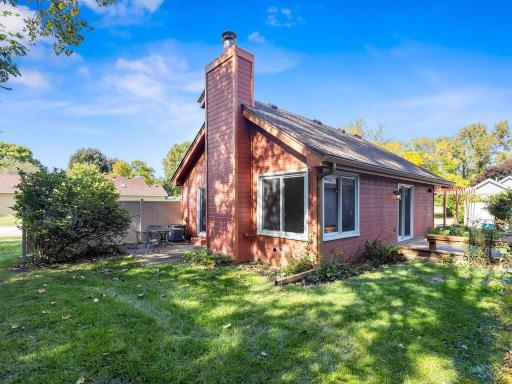 Oakdale Townhome with Private fenced backyard with wooded preserve views offering privacy and tranquility.MN 55128 USA-006-015-006-MLS_Size.jpg