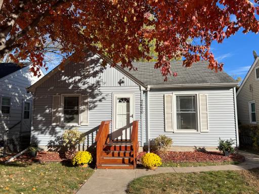Welcome Home to 2620 Abbott Avenue N full of charm and accented by a stunning maple tree, offering vibrant fall colors!