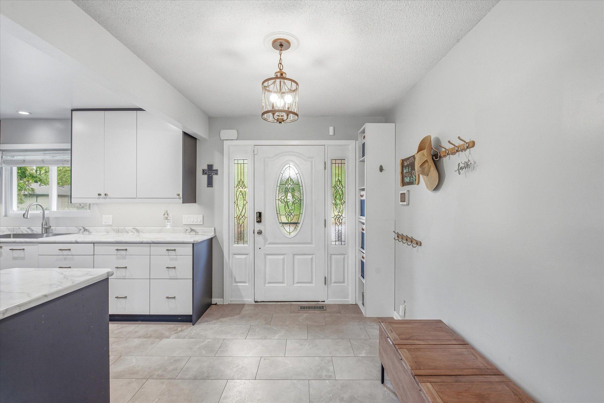 A spacious entry welcomes guests with a bright and inviting first impression.