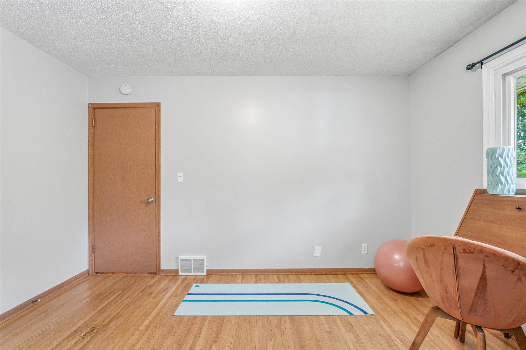 Bright and comfortable with flexible space for work, fitness, or relaxation.