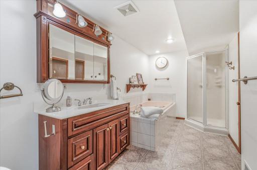The oversized bathroom offers a large vanity with exceptional storage.