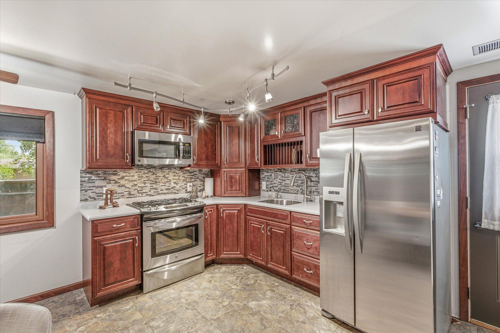 This spacious lower-level kitchen is ideal for entertaining or hosting guests.