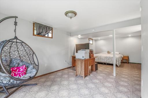 A spacious lower-level bedroom is perfect for guests or multi-generational living.