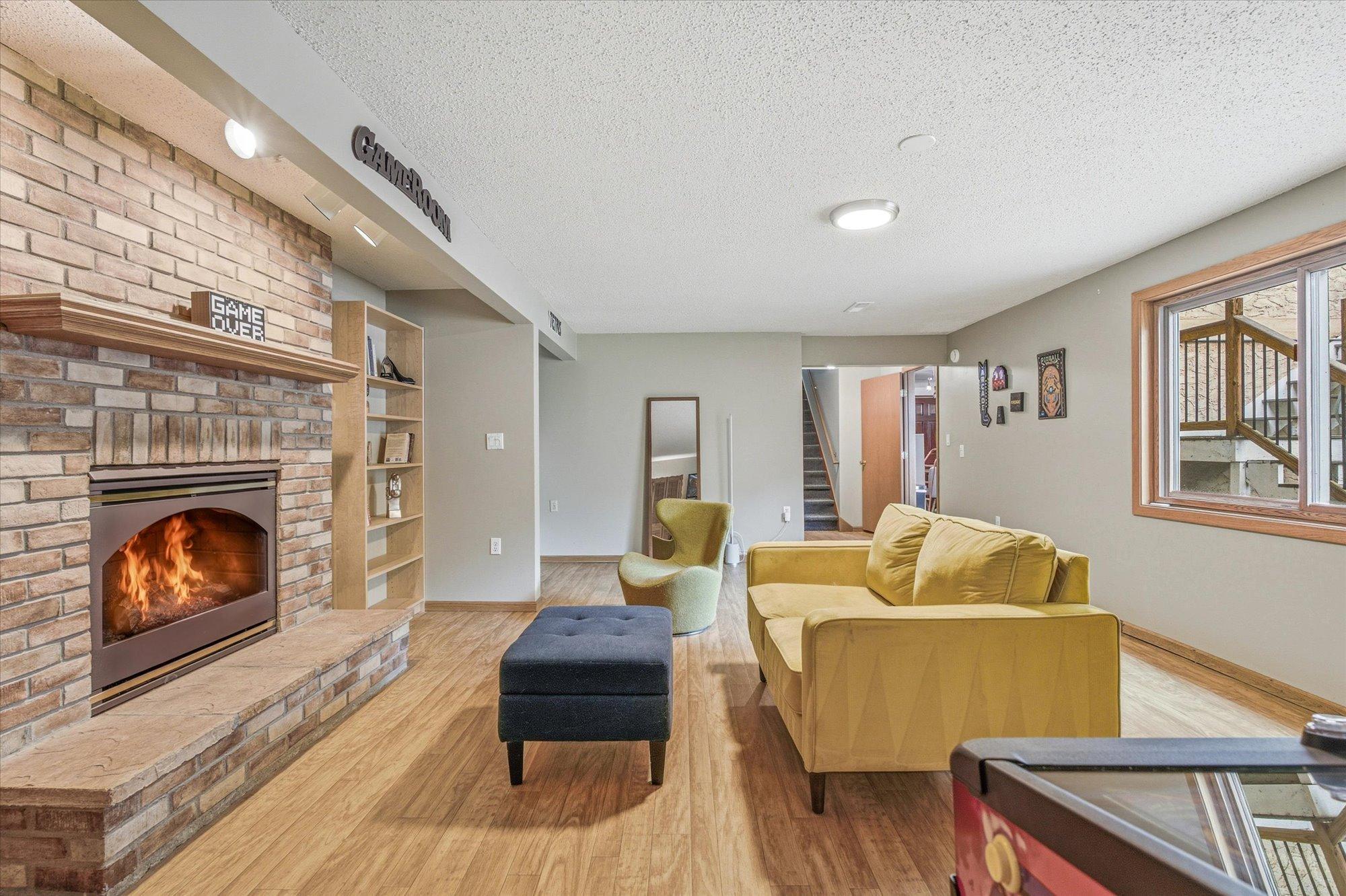 A second view showcases the impressive size of this flexible family room.