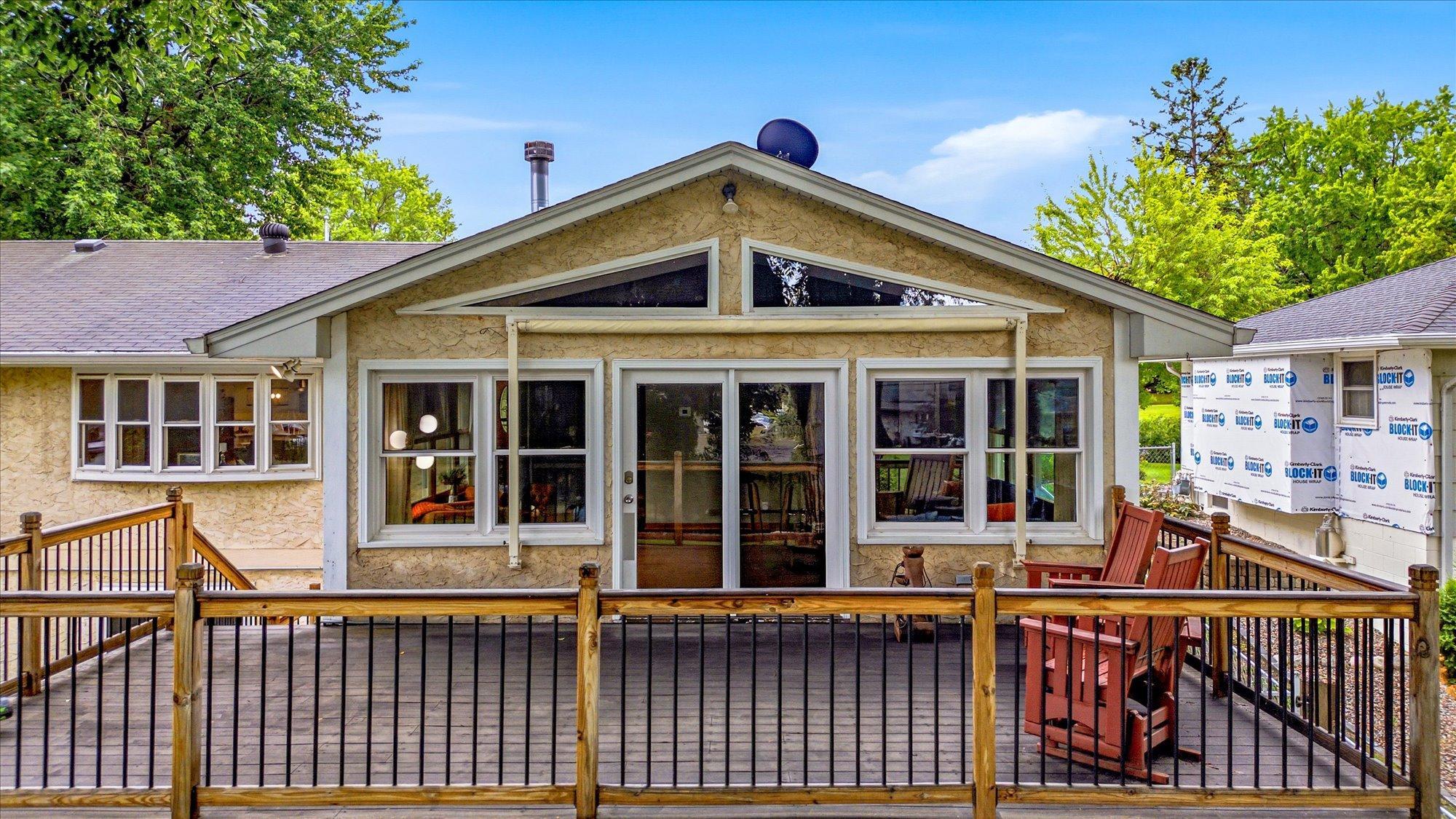 The expansive deck provides the perfect setting for outdoor dining and relaxing.