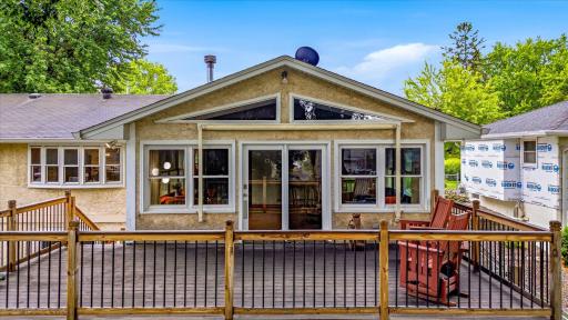 The expansive deck provides the perfect setting for outdoor dining and relaxing.