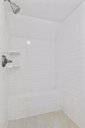 A separate, tiled shower completes the Primary Bathroom.