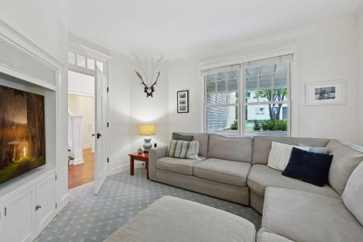 The TV room is a relaxing space where you will enjoy watching your favorite shows and movies. The room features designer carpeting and a built-in entertainment center.