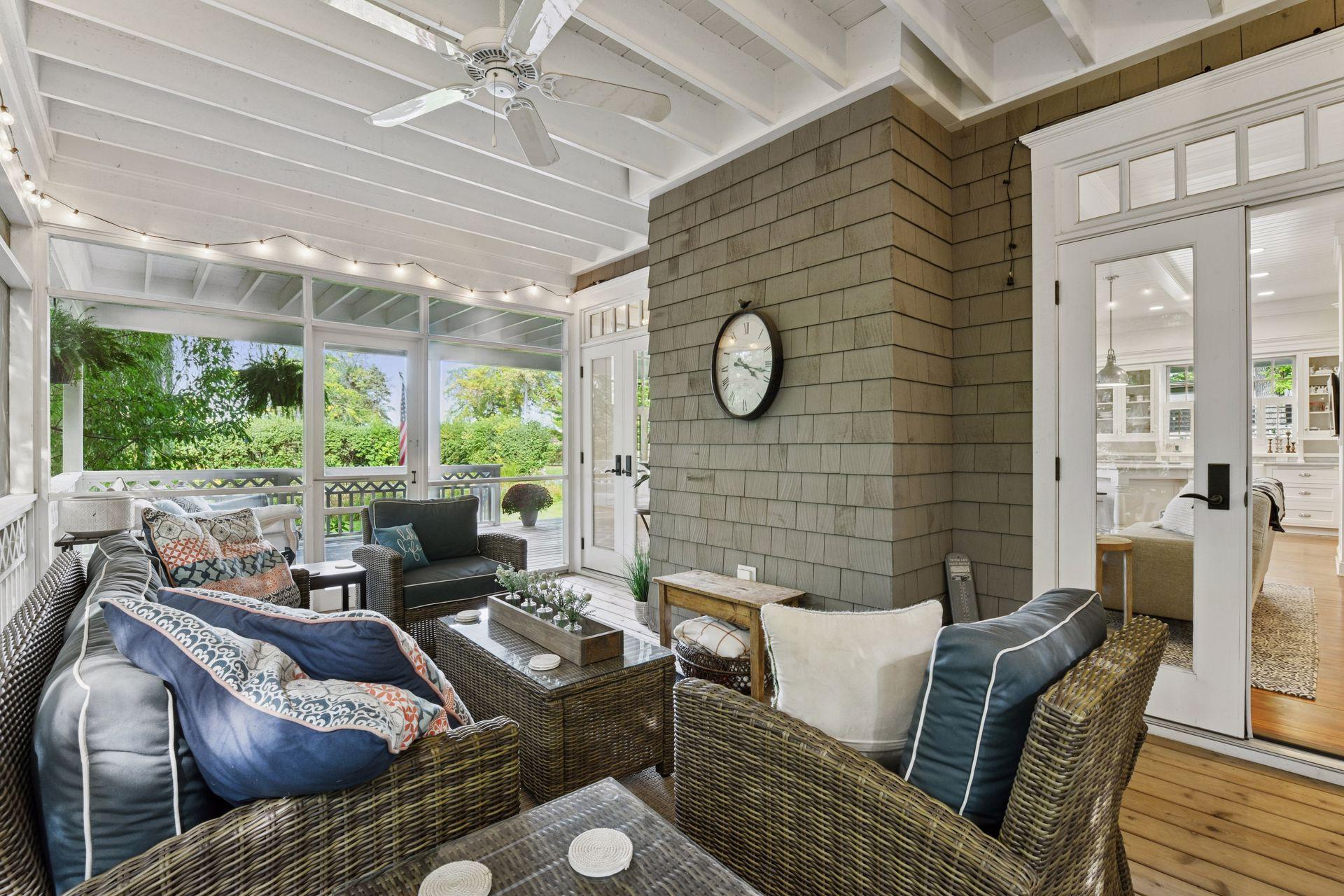 The Screen Porch is a space that beckons you to relax and slow down while enjoying the private setting.
