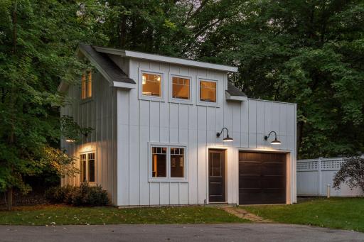 Newly constructed, the Carriage House is the perfect addition to this property with a third garage stall and welcoming spaces.