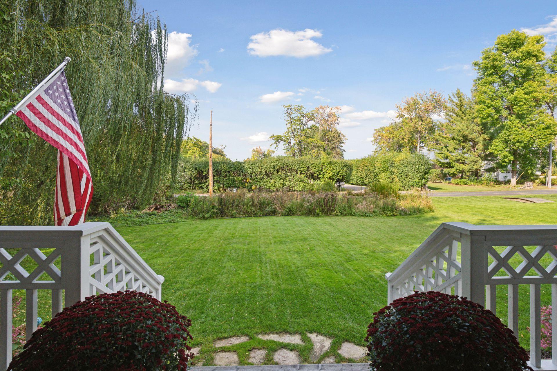 Step down off the Deck to the large, level lawn.