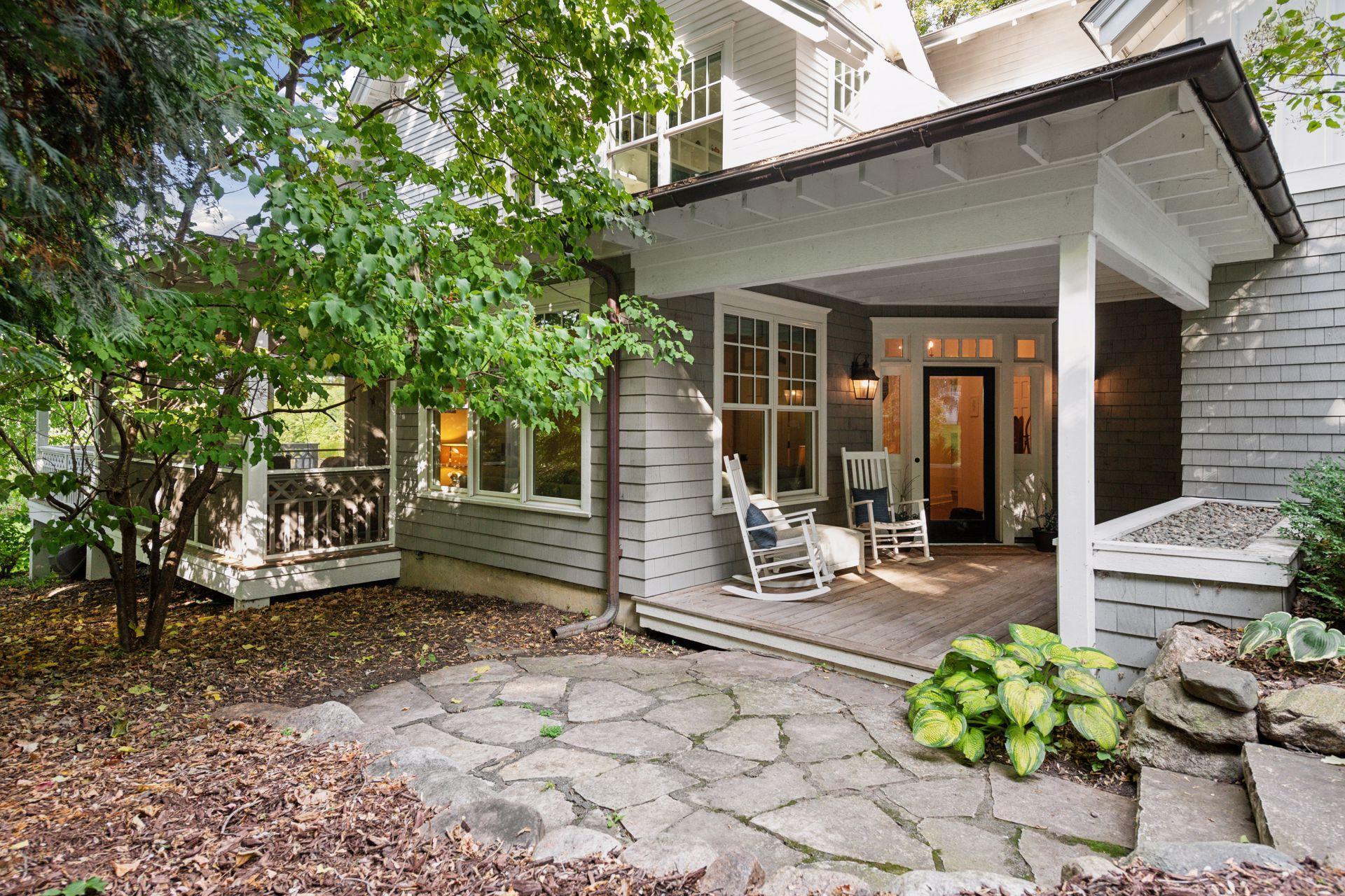 A covered front porch invites you in.