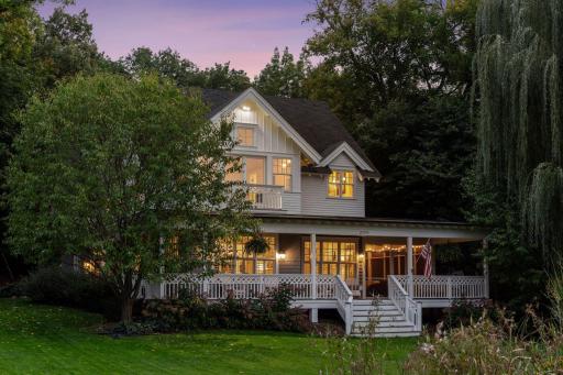 A warm and inviting home nestled in a storybook setting, where timeless charm meets everyday comfort.