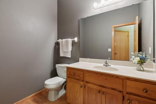 Main Floor 1/2 Bath conveniently located off garage entry!