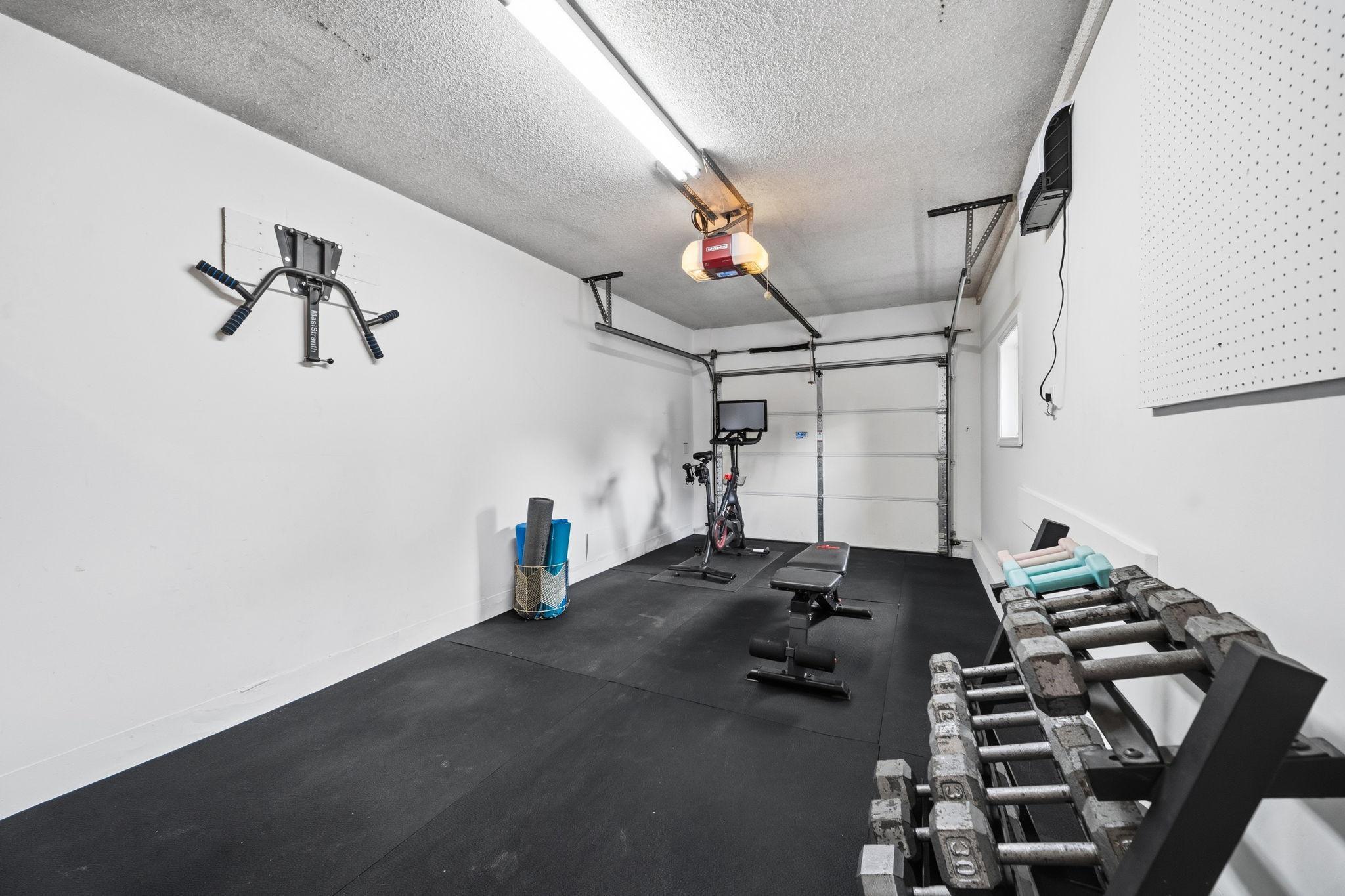 Attached one car garage or workout/flex room