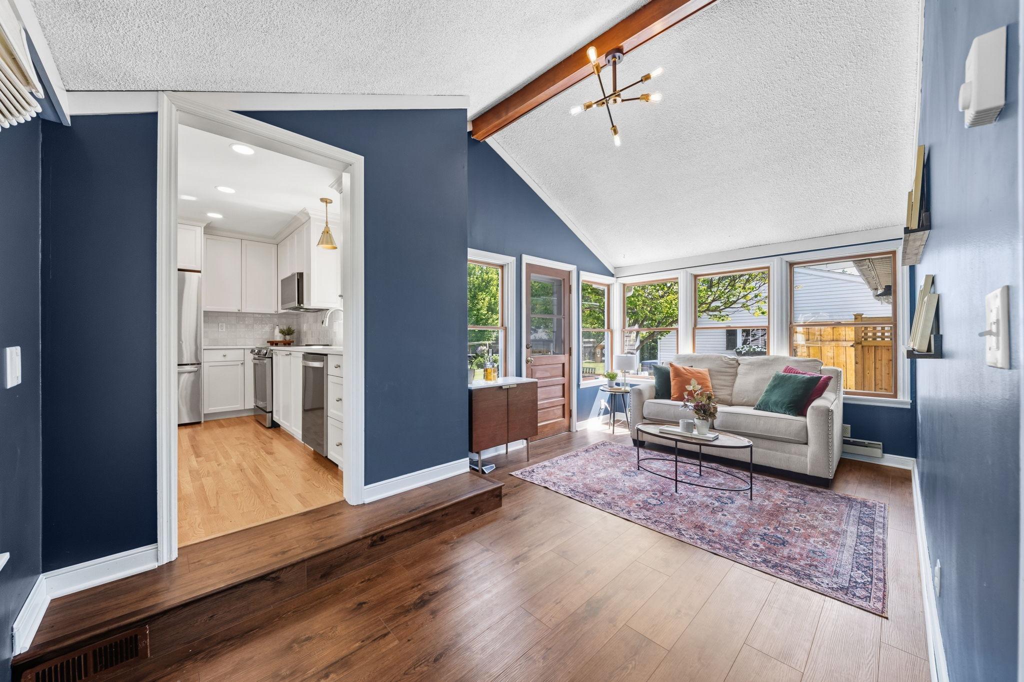 Main level sunroom w/ vaulted ceilings