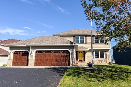 Photo for 6745 Wildflower Drive S, Cottage Grove, MN 55016 - listing #6795281 New garage doors and recently seal coated driveway