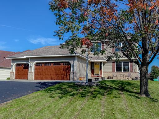 Welcome Home! New Windows throughout, new furnace, new concrete front patio, new pool liner