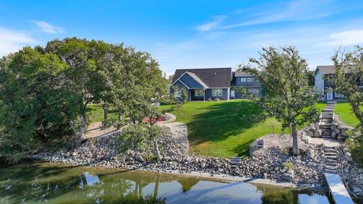 Beautiful, gradual shorefront with a sandy walkout. Only 3 steps out to the dock and lakefront.