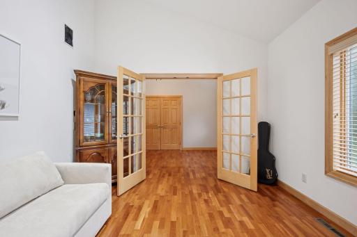 Double french doors add character to the home office.