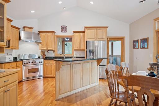 Well-appointed kitchen with granite countertops, custom cabinetry and stainless steel appliances.