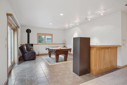 Enjoy a game of pool or make this room into a built in bar area. It's plumbed for a wet bar.