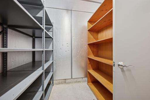 The basement has two separate storage rooms as well as this dedicated safe room.