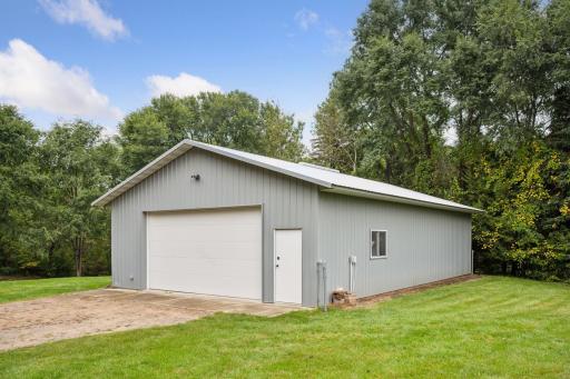 Every lake owner's dream! A dedicated pole barn to store boats, snowmobiles, jet skis or use it as your personal workshop. Barn is maintenance free with steel siding.
