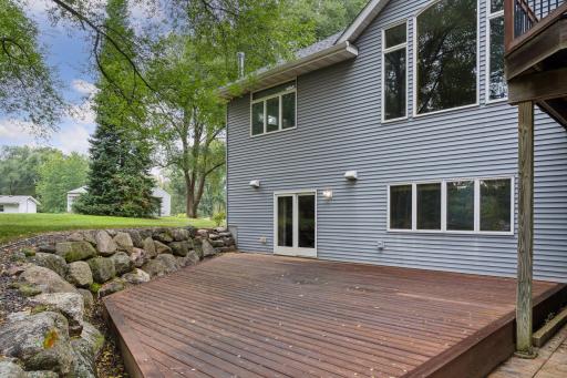 The lower level walks out to a newly installed deck and seamlessly flows to the firepit.