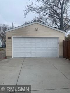 Double garage, automatic door, service door and rafter storage