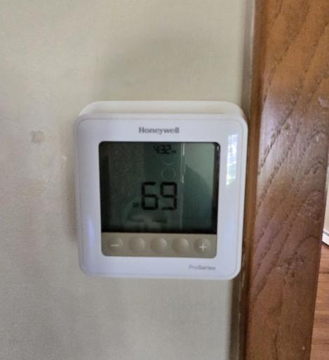 Honeywell gas/hot water heat thermostat.