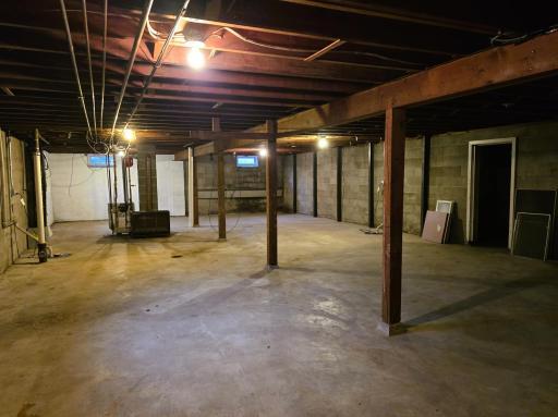 Full unfinished basement view 2.