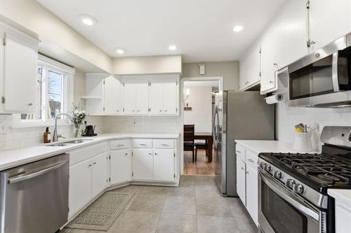 Bright and efficient kitchen with ample cabinet storage, updated finishes, and a clean, functional layout designed for everyday use.