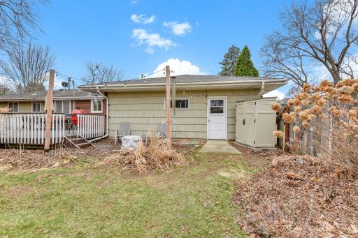 Rear exterior view highlighting convenient access to the home and additional outdoor space.