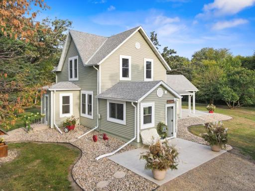 This 1900's farmhouse was completely rebuilt from the studs with hand-crafted details and modern finishes, including hickory floors, knotty pine stairs, barn doors, and galvanized accents.