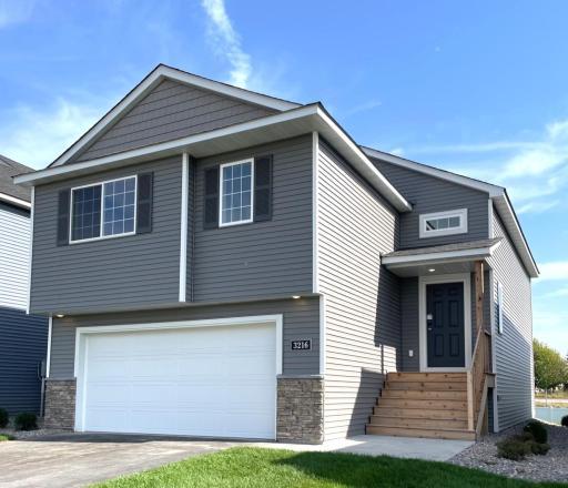 3216 Kady Ave NE- Completed New Construction will be ready for Quick Move-in! Highlights include a Finished Walkout Lower Level located on a No Outlet Street!