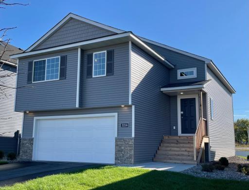 3216 Kady Ave NE- Completed New Construction Home ready for Quick Move-in! Highlights include a Finished Walkout Lower Level located on a No Outlet Street!