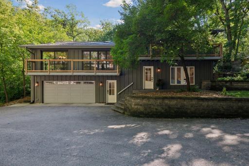 Nestled among the trees, your expansive yet cozy home awaits.