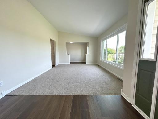 Living room - all new flooring, paint, trim and lighting throughout the home.