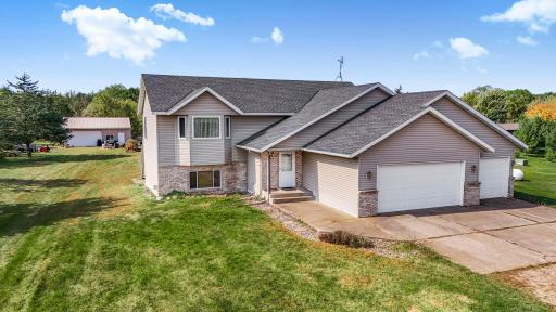 On nearly 1 3/4 Acre just minutes from town, this 5 BR 3 BA walkout offers tons of room for work or play!