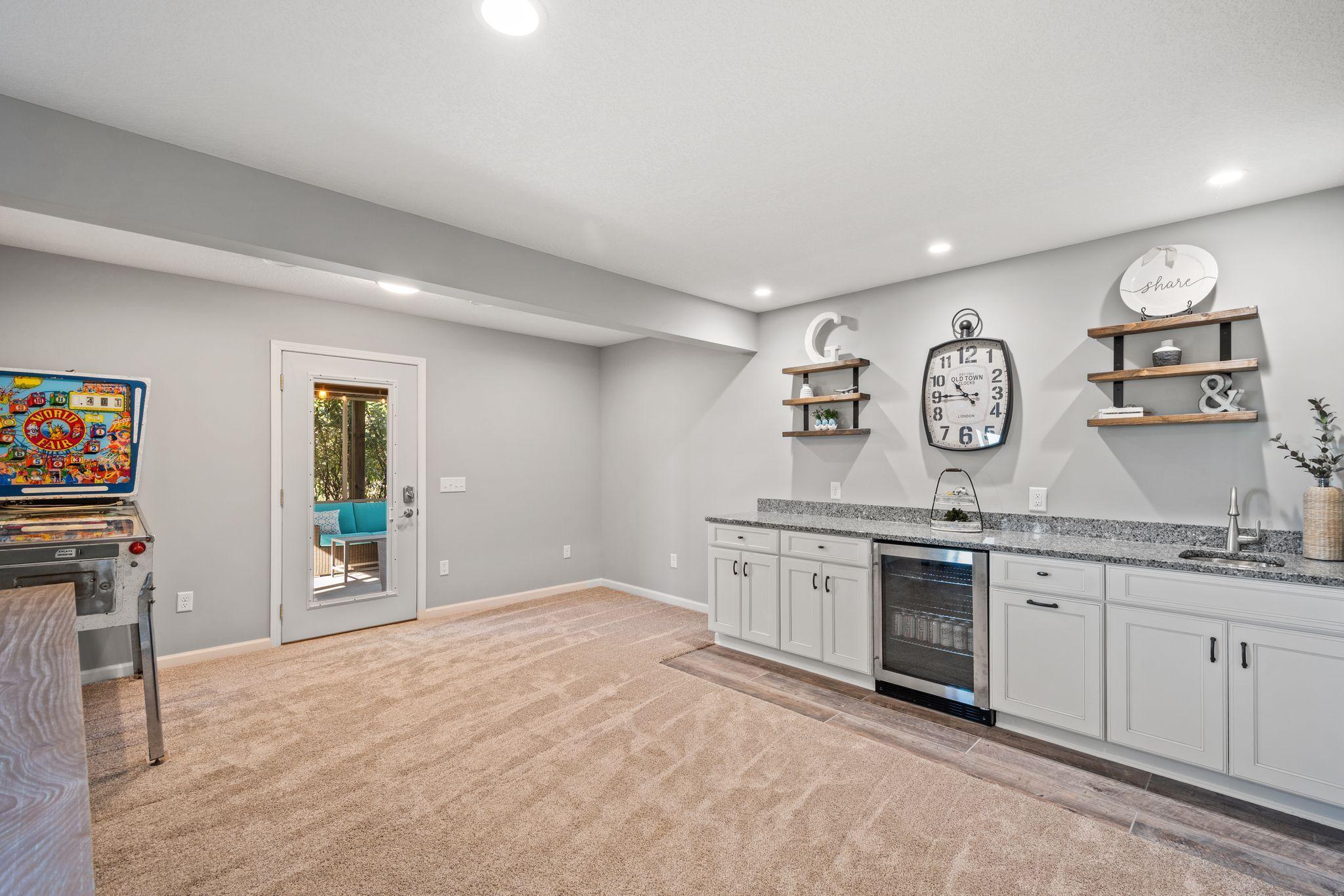 Easy access to the screened in porch enable indoor/outdoor living.