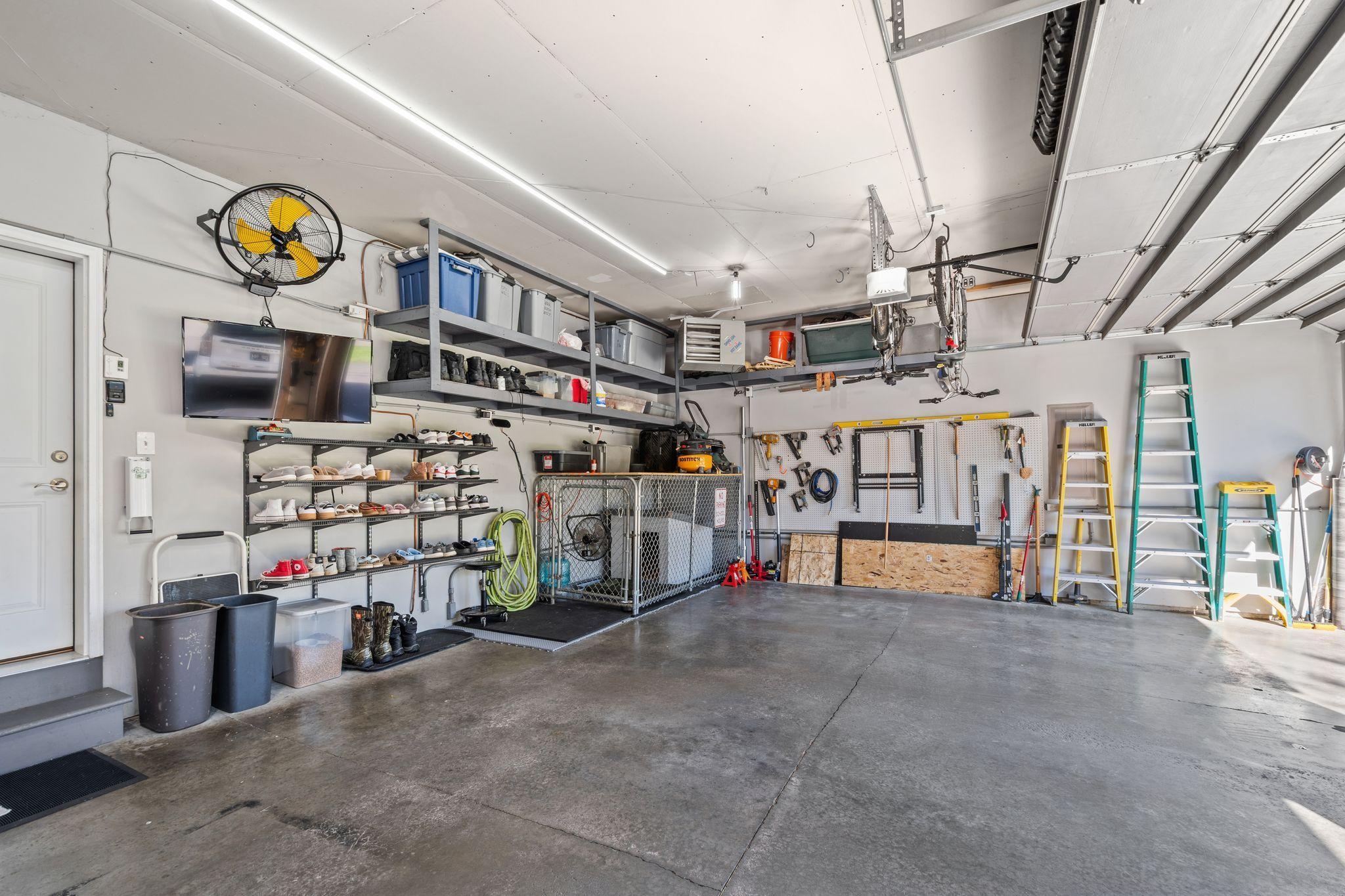 Even the garage is impressively organized! (All mounted shelves/storage will remain).
