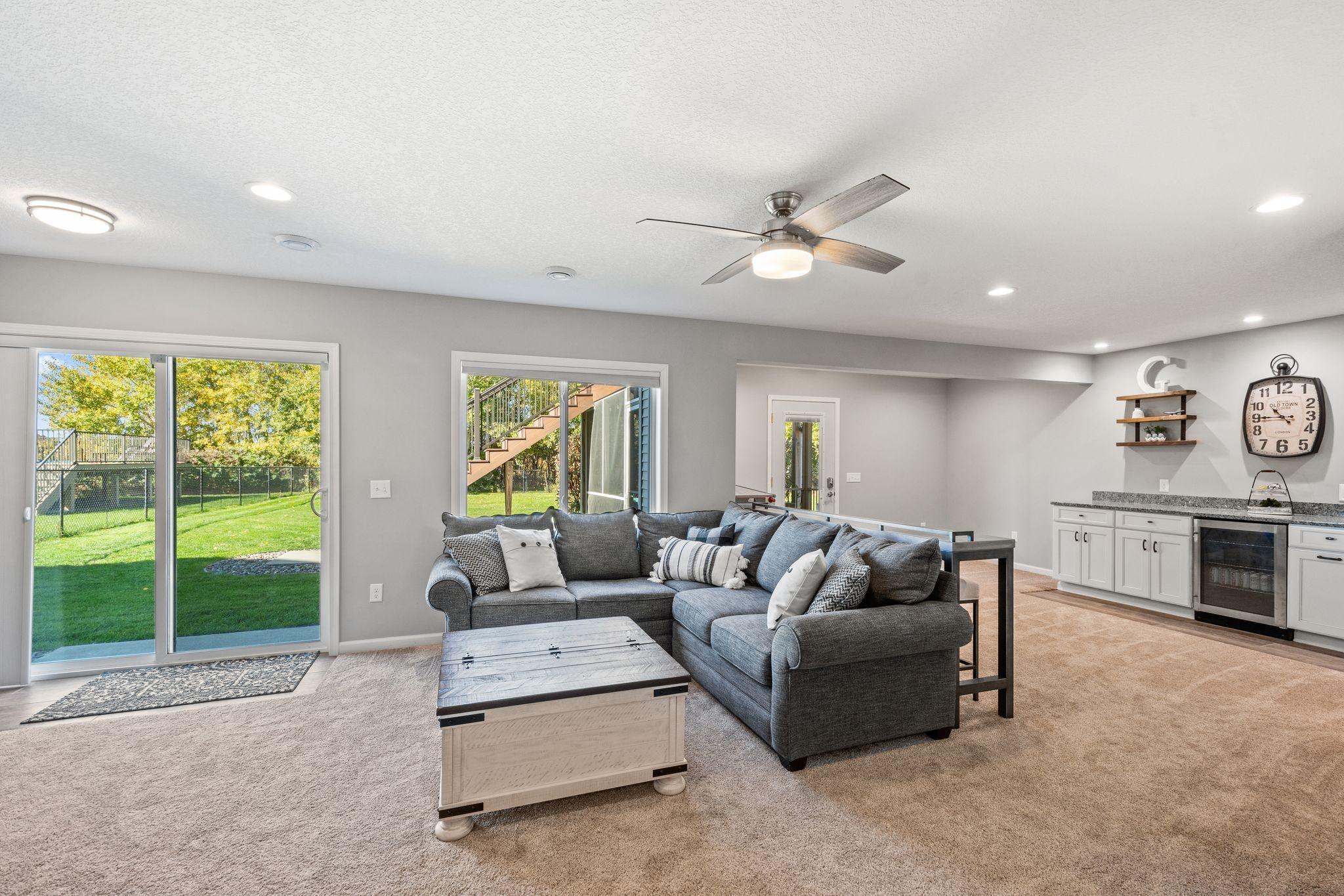 Large windows and two doors to the backyard give ample natural light.