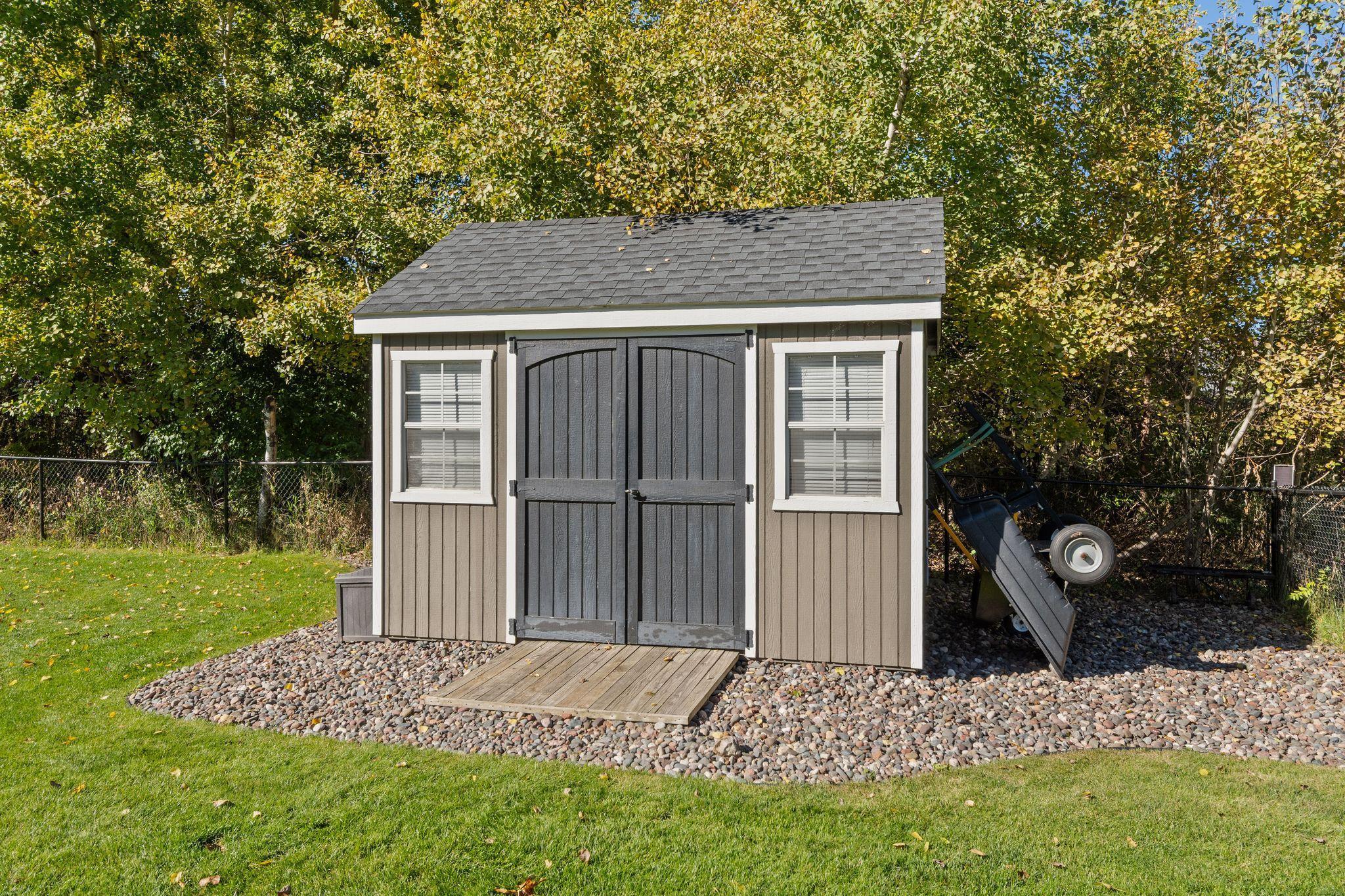 Keep your lawn equipment out of the garage, but still protected from the elements.