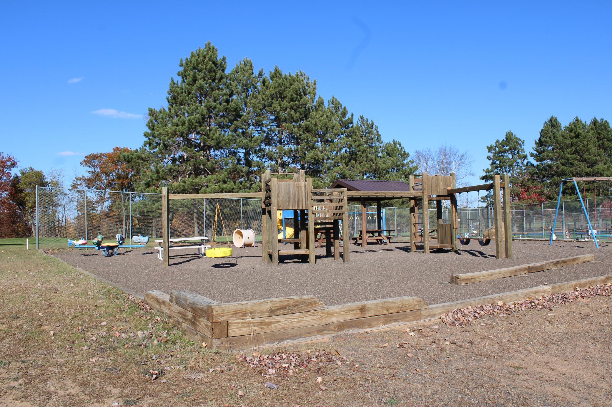 Playground near clubhouse, sports courts, pool & fitness center
